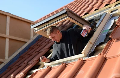 Pose de fenêtres de toit Velux à Glamondans